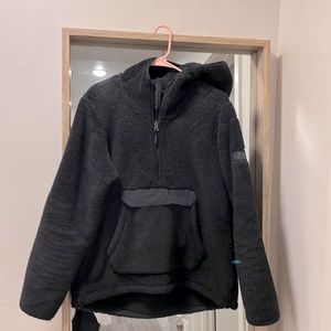North Face fleece hooded pullover with pocket in front. Women’s size XL, black